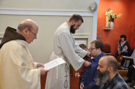 Our new Postulants Receive the Tau Cross, symbol of St. Francis.