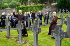 Br Martin Bennett OFM Cap. blessing the graves